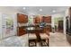 Spacious kitchen with island seating, modern appliances, and outdoor access at 1204 Caribou Xing, Durham, NC 27713