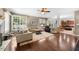 Spacious living room with fireplace, hardwood floors, and plenty of natural light at 1204 Caribou Xing, Durham, NC 27713