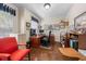 Well-lit office space featuring a large desk, hardwood floors, and ample storage at 1204 Caribou Xing, Durham, NC 27713
