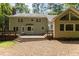 Exterior view of a multi-level deck that offers ample space for outdoor enjoyment at 128 Cobblestone Dr, Chapel Hill, NC 27516