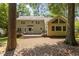 Exterior view of a multi-level deck that offers ample space for outdoor enjoyment at 128 Cobblestone Dr, Chapel Hill, NC 27516