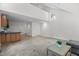Finished basement with a kitchenette, providing extra living space and functionality at 128 Cobblestone Dr, Chapel Hill, NC 27516