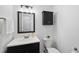 Well-lit bathroom with modern fixtures, a vanity, and storage at 128 Cobblestone Dr, Chapel Hill, NC 27516