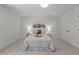 Inviting bedroom with a plush bed, stylish bedside tables, and soft, neutral decor at 128 Cobblestone Dr, Chapel Hill, NC 27516