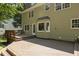 View of the deck, featuring a bay window, and an entrance to the home at 128 Cobblestone Dr, Chapel Hill, NC 27516
