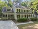 Lovely home with a spacious front porch, offering a cozy and inviting curb appeal at 128 Cobblestone Dr, Chapel Hill, NC 27516