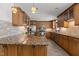Spacious kitchen featuring granite countertops, tile backsplash, and stainless steel appliances at 128 Cobblestone Dr, Chapel Hill, NC 27516