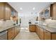 Spacious kitchen with ample cabinet space and modern tiled flooring at 128 Cobblestone Dr, Chapel Hill, NC 27516