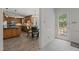 Open kitchen featuring granite countertops, tile backsplash, stainless steel appliances and a breakfast nook at 128 Cobblestone Dr, Chapel Hill, NC 27516