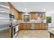 Well-equipped kitchen with stainless steel appliances and granite countertops at 128 Cobblestone Dr, Chapel Hill, NC 27516