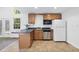 Kitchen with breakfast bar, stainless steel appliances and hardwood cabinets at 128 Cobblestone Dr, Chapel Hill, NC 27516
