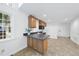 Efficient kitchen with a breakfast bar and stainless steel appliances at 128 Cobblestone Dr, Chapel Hill, NC 27516