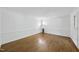 Spacious living room showcasing hardwood floors and white trim at 128 Cobblestone Dr, Chapel Hill, NC 27516
