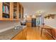 Spacious kitchen with hardwood floors, stainless steel appliances, and granite countertops at 1506 Ephesus Church Rd, Chapel Hill, NC 27517