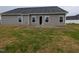 The backyard has an open patio and green lawn at 1590 Pecan Drive # 45, Nashville, NC 27856