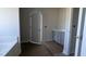 Bathroom with double sinks, neutral walls, and natural light coming from the window at 1590 Pecan Drive # 45, Nashville, NC 27856