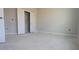 Spacious bedroom with white trim, walk-in closet, and natural light coming from the window at 1590 Pecan Drive # 45, Nashville, NC 27856