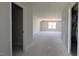 Unfinished bonus room with natural light, offering ample space for customization and versatile use at 1590 Pecan Drive # 45, Nashville, NC 27856