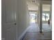 Bright hallway leading to the main entrance, living area, and other parts of this newly built house at 1590 Pecan Drive # 45, Nashville, NC 27856