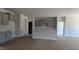Open-concept kitchen with gray cabinets, light countertops, and a central island, perfect for entertaining at 1590 Pecan Drive # 45, Nashville, NC 27856