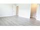 Bedroom featuring an open closet, luxury vinyl plank flooring, and neutral paint at 1635 Pecan Drive # 26, Nashville, NC 27856
