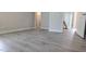 Spacious bedroom with luxury vinyl plank flooring and neutral paint at 1635 Pecan Drive # 26, Nashville, NC 27856