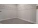 Walk-in closet with wire shelving and neutral carpeting providing ample storage space at 1635 Pecan Drive # 26, Nashville, NC 27856