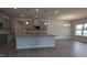 Modern kitchen with gray cabinetry, stainless appliances, and a large kitchen island at 1635 Pecan Drive # 26, Nashville, NC 27856