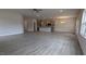 Spacious living area with gray wood-look floors, gray cabinets, and a center island at 1635 Pecan Drive # 26, Nashville, NC 27856