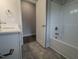 Bathroom with modern fixtures including a white vanity and tub at 1640 Pecan Drive # 44, Nashville, NC 27856