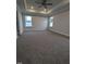 A spacious bedroom with carpet flooring and a ceiling fan at 1640 Pecan Drive # 44, Nashville, NC 27856