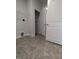 Convenient laundry room features shelving and utility hookups at 1640 Pecan Drive # 44, Nashville, NC 27856