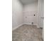 The laundry room is equipped with shelving and connections for a washer and dryer at 1640 Pecan Drive # 44, Nashville, NC 27856