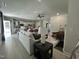 Open-concept living area with views of kitchen and an adjoining room at 1640 Pecan Drive # 44, Nashville, NC 27856