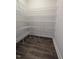 Walk-in pantry with multiple wire shelves providing ample storage space at 1640 Pecan Drive # 44, Nashville, NC 27856