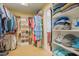 Spacious walk-in closet with built-in shelving and ample storage for clothes and accessories at 1714 Carson St, Raleigh, NC 27608