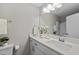 Bright bathroom featuring a modern vanity with a toilet and a shower-tub combo at 1734 Stage Rd, Durham, NC 27703