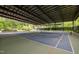 Covered tennis and pickleball courts offer a convenient space for friendly matches and community recreation at 1734 Stage Rd, Durham, NC 27703