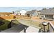 View of a fenced backyard from a wooden deck featuring well-maintained grass at 1816 Sandoval Dr, Durham, NC 27703