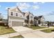 Street view of well-maintained homes with manicured lawns, showcasing neighborhood charm and curb appeal at 1816 Sandoval Dr, Durham, NC 27703
