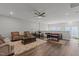 Spacious recreation room featuring a pool table, seating area, and hardwood floors at 1816 Sandoval Dr, Durham, NC 27703