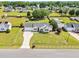Aerial view of a single-Gathering home displaying manicured lawn and long driveway at 182 Jesse Dr, Smithfield, NC 27577