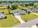 Aerial view of the home showcasing well-manicured front yard and long driveway at 182 Jesse Dr, Smithfield, NC 27577