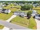 Aerial view showing the front yard with long driveway and well-kept lawn at 182 Jesse Dr, Smithfield, NC 27577