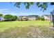 Large backyard view showcasing the home's spaciousness, deck, and outdoor recreational possibilities at 182 Jesse Dr, Smithfield, NC 27577