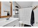 Stylish bathroom with modern fixtures, decorative shelving, and a clean design at 182 Jesse Dr, Smithfield, NC 27577