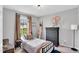 Cozy bedroom with neutral colors, natural light and decorative accents at 182 Jesse Dr, Smithfield, NC 27577