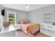 Comfortable bedroom with natural light and calming decor at 182 Jesse Dr, Smithfield, NC 27577