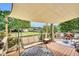 Outdoor deck with comfortable seating and a shade canopy for relaxing at 182 Jesse Dr, Smithfield, NC 27577
