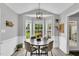 Inviting dining area featuring a round table, modern decor, and bright, natural light at 182 Jesse Dr, Smithfield, NC 27577